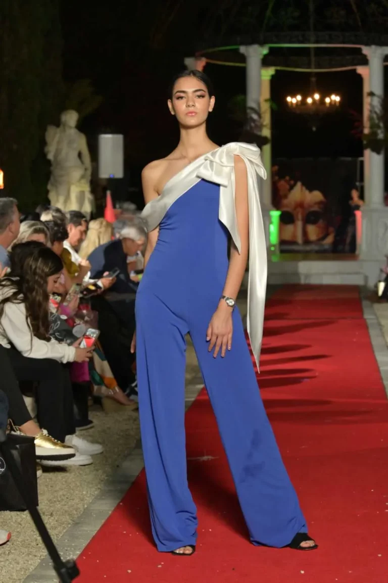 This is an image of a lady wearing a custom made gala dress made by Betzabe Pujaico Designs in North Miami, FL.