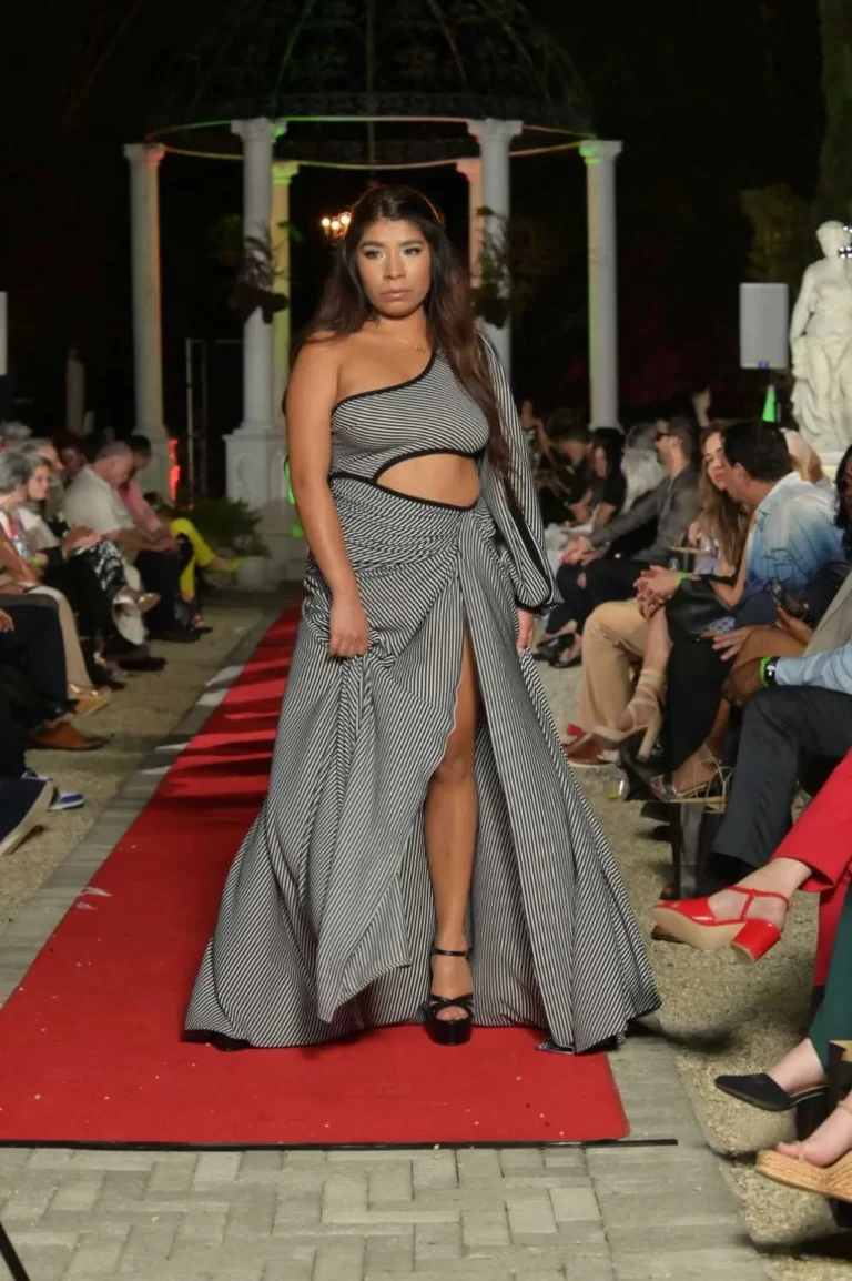 This is an image of a lady wearing a custom made gala dress made by Betzabe Pujaico Designs in North Miami, FL.