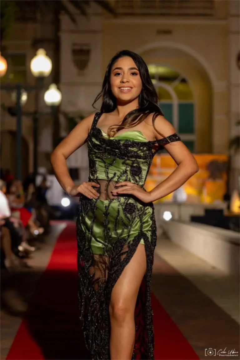 This is an image of a lady wearing a custom made gala dress made by Betzabe Pujaico Designs in North Miami, FL.