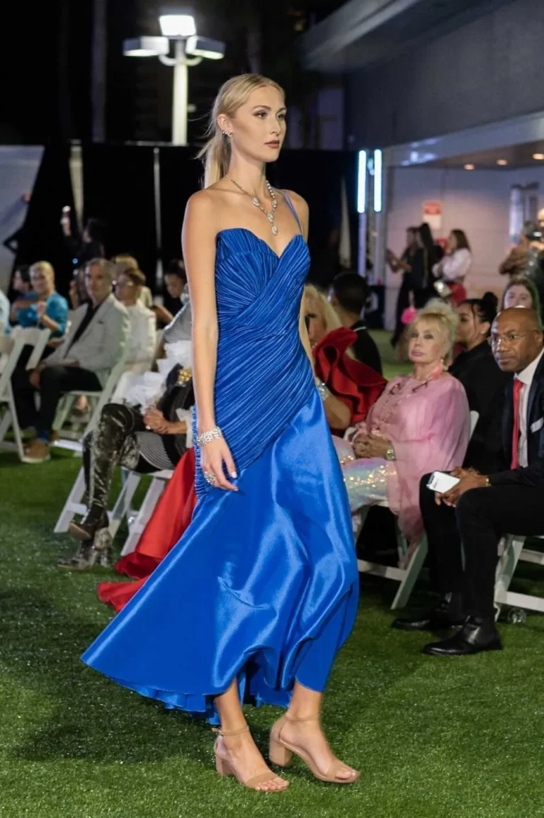 This is an image of a lady wearing a custom made gala dress made by Betzabe Pujaico Designs in North Miami, FL.