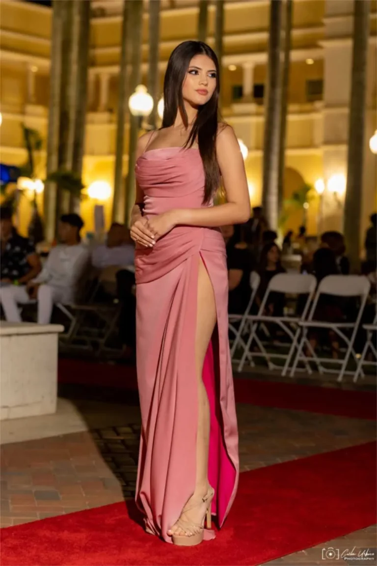This is an image of a lady wearing a custom made gala dress made by Betzabe Pujaico Designs in North Miami, FL.