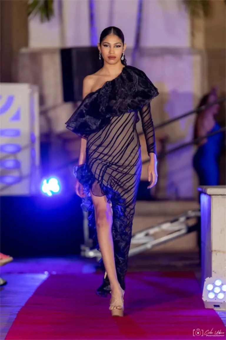 This is an image of a lady wearing a custom made gala dress made by Betzabe Pujaico Designs in North Miami, FL.