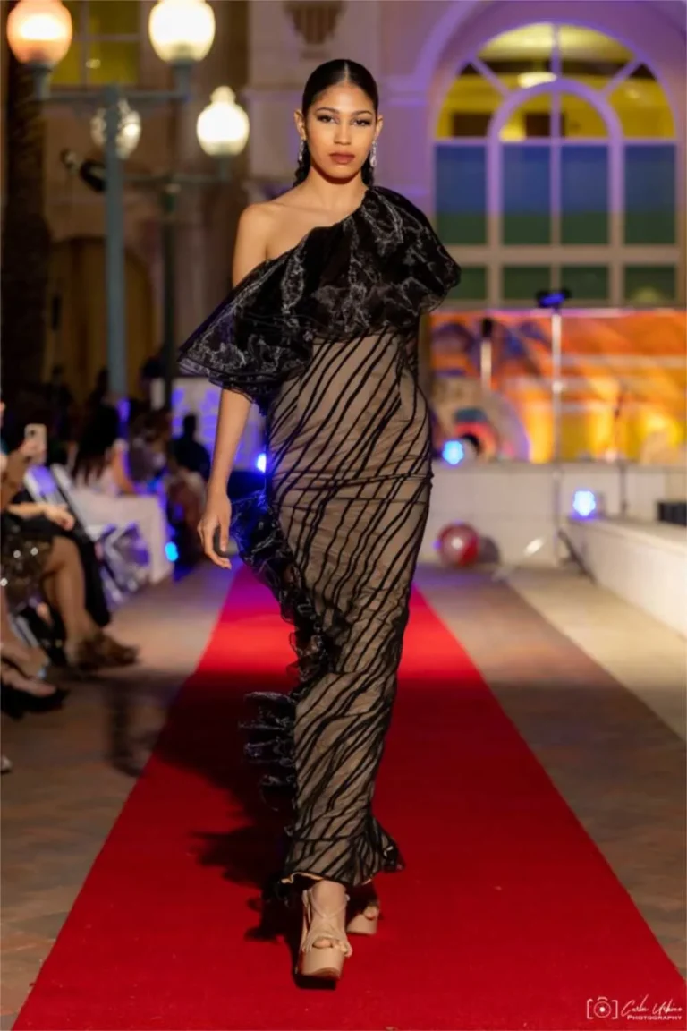 This is an image of a lady wearing a custom made gala dress made by Betzabe Pujaico Designs in North Miami, FL.