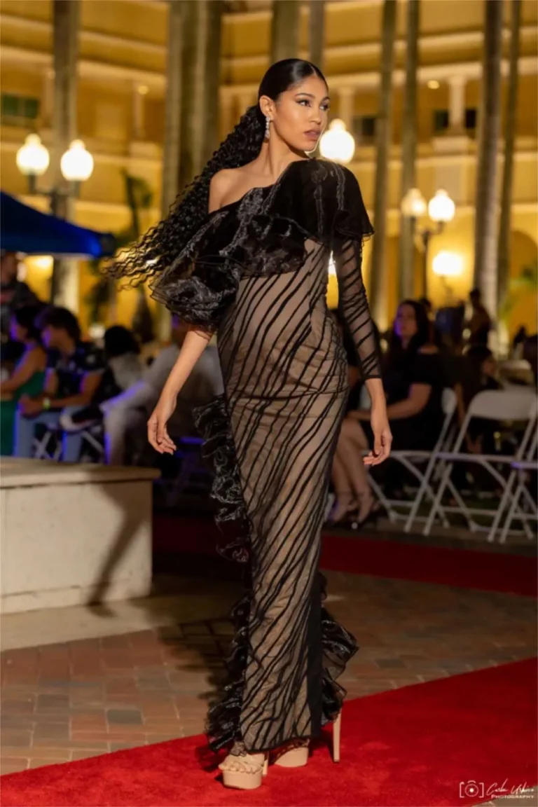 This is an image of a lady wearing a custom made gala dress made by Betzabe Pujaico Designs in North Miami, FL.