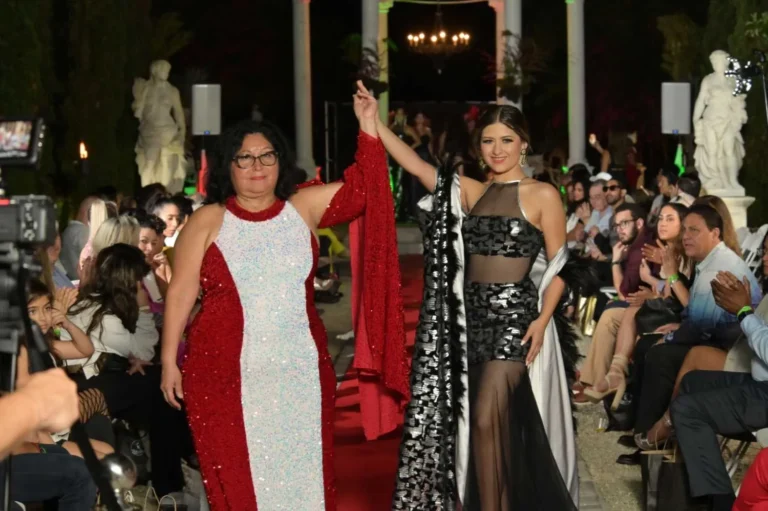 This is an image of a lady wearing a custom made gala dress made by Betzabe Pujaico Designs in North Miami, FL.