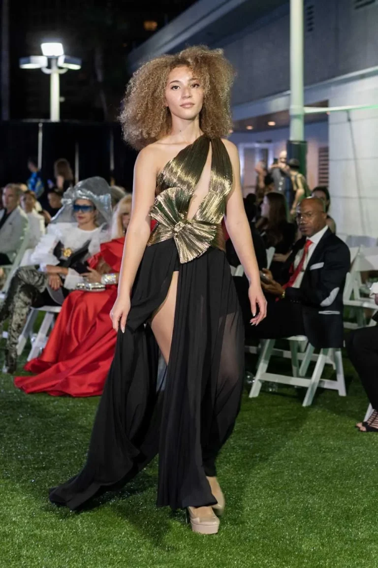 This is an image of a lady wearing a custom made gala dress made by Betzabe Pujaico Designs in North Miami, FL.