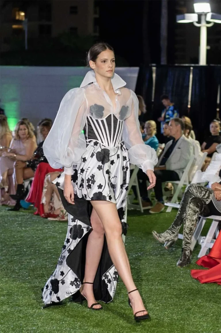 This is an image of a lady wearing a custom made gala dress made by Betzabe Pujaico Designs in North Miami, FL.