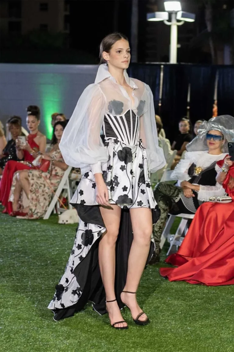 This is an image of a lady wearing a custom made gala dress made by Betzabe Pujaico Designs in North Miami, FL.