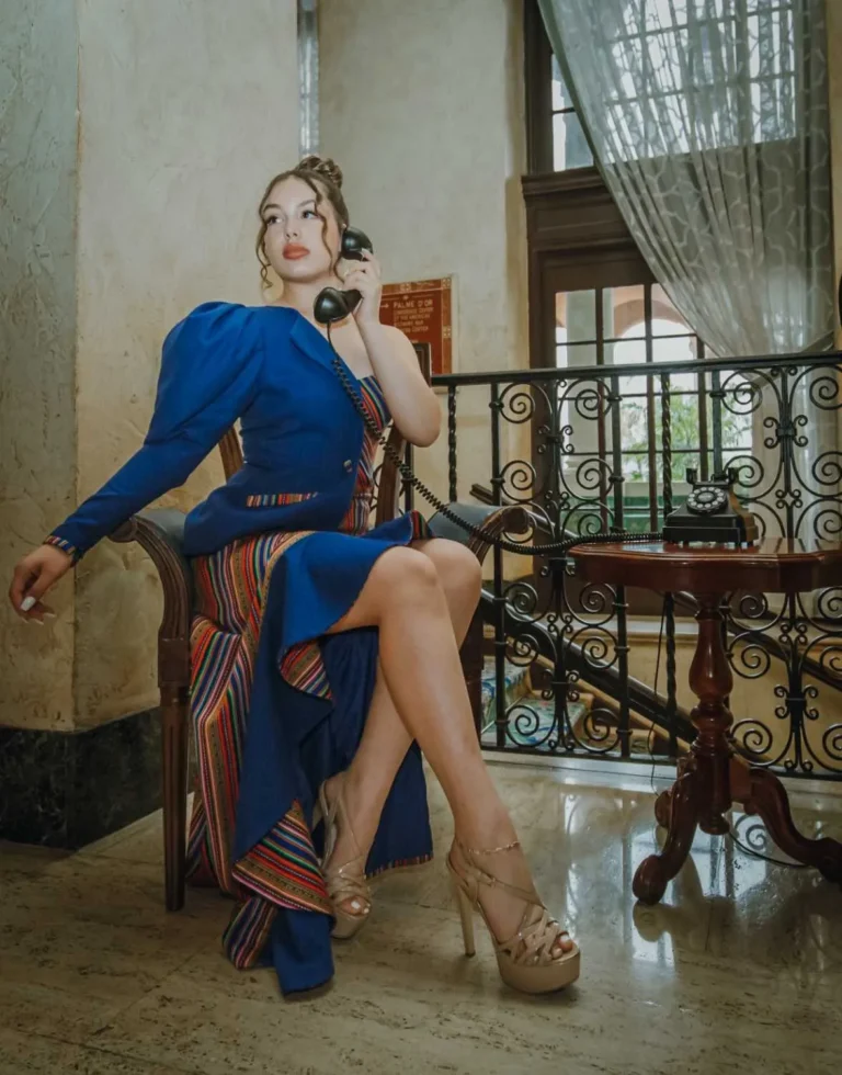 This is an image of a lady wearing a custom made inca style dress made by Betzabe Pujaico Designs in North Miami, FL.