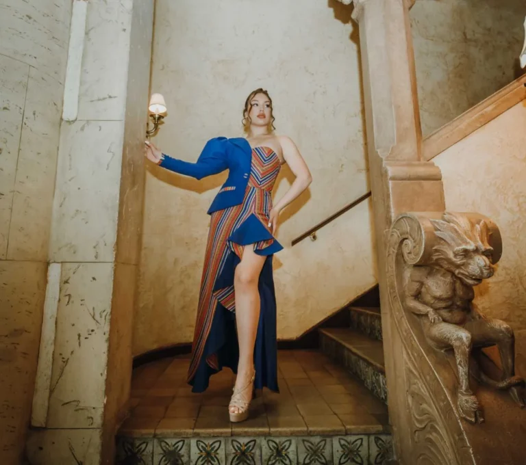 This is an image of a lady wearing a custom made inca style dress made by Betzabe Pujaico Designs in North Miami, FL.